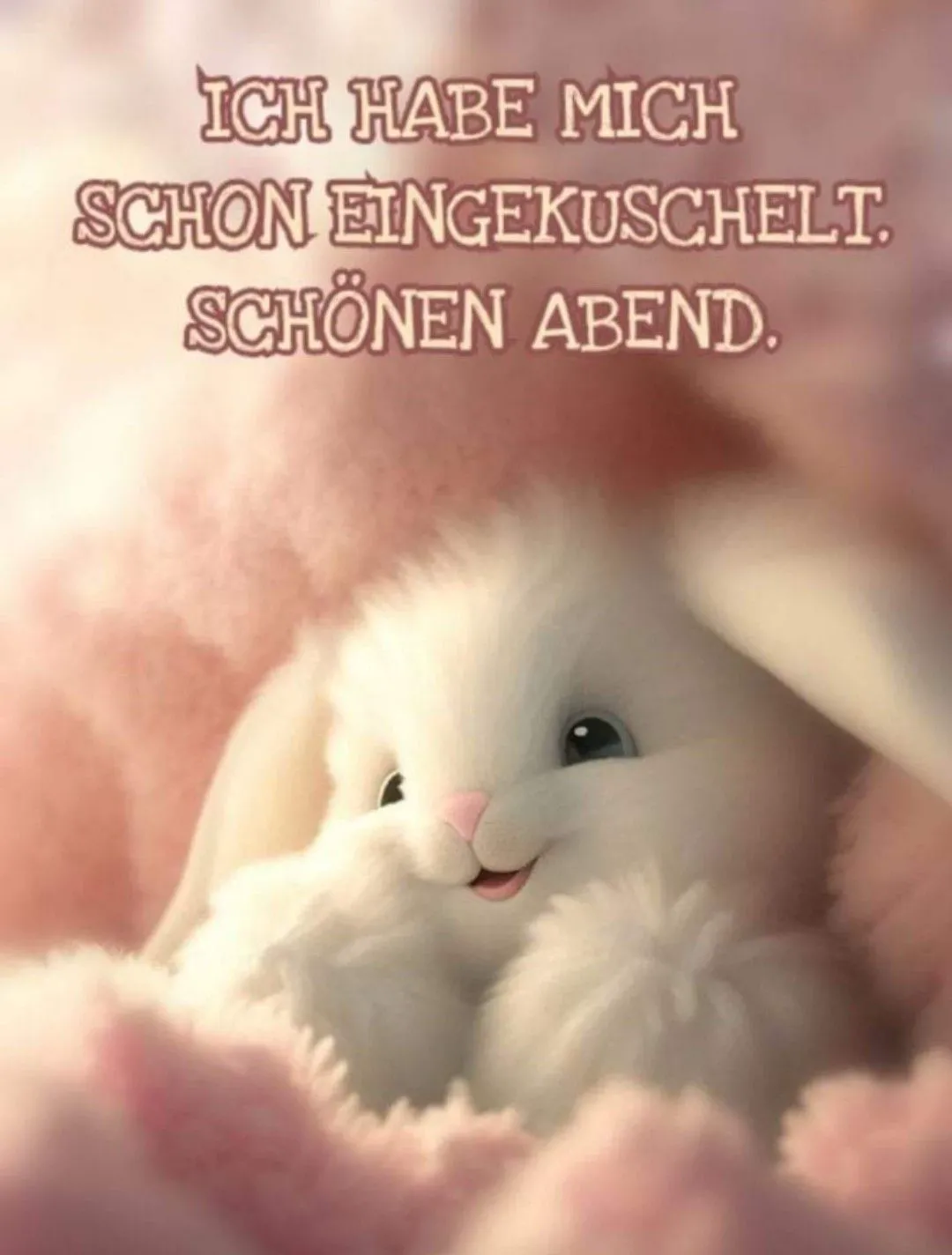 Ein niedliches, flauschiges weißes Häschen kuschelt sich gemütlich in eine weiche, rosafarbene Decke und lächelt süß. Es ist ein herzlicher Guten-Abend-Gruß.